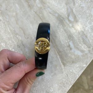 Black and gold Tori Burch cuff